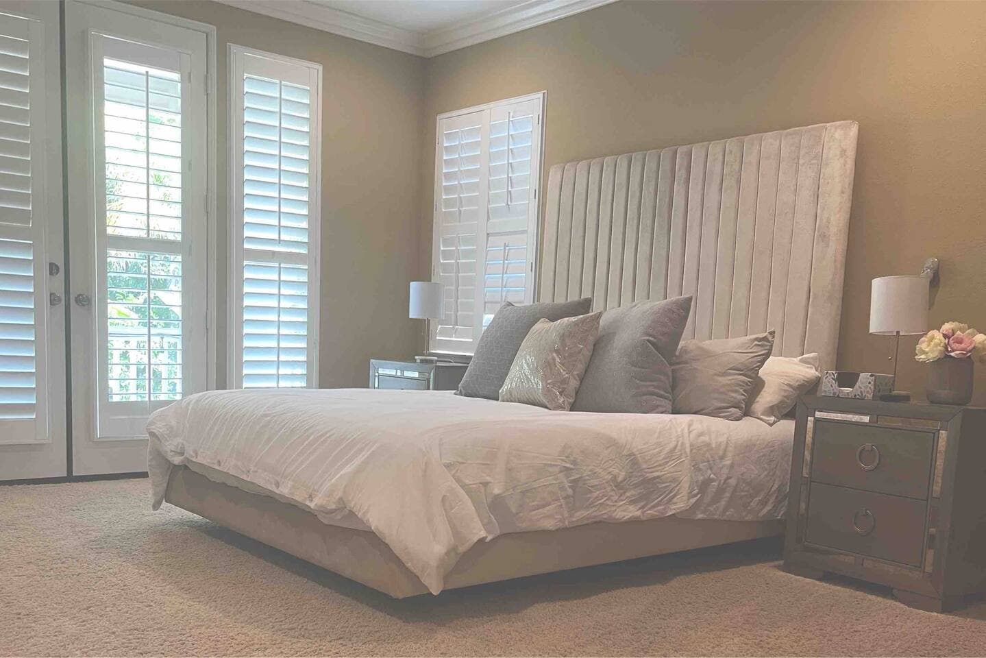 Primary bedroom with a king sized bed