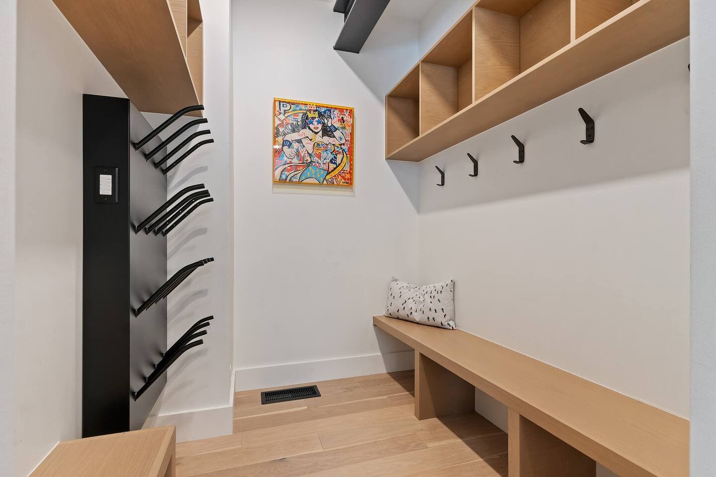 Boot room with 8 pair boot dryer and space to store your winter gear.