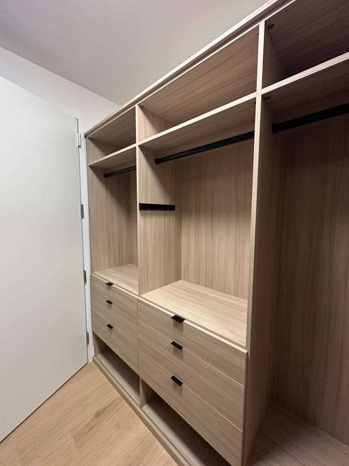 Custom built in closet in primary bedroom